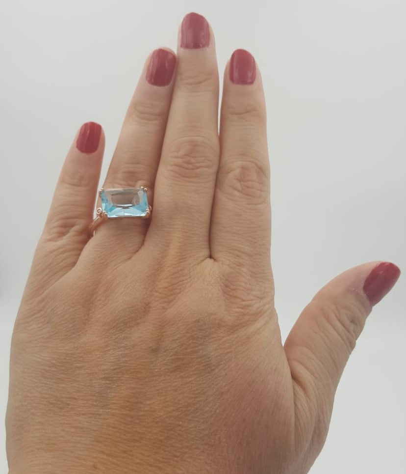 Stunning light blue emerald shape women's Ring.
